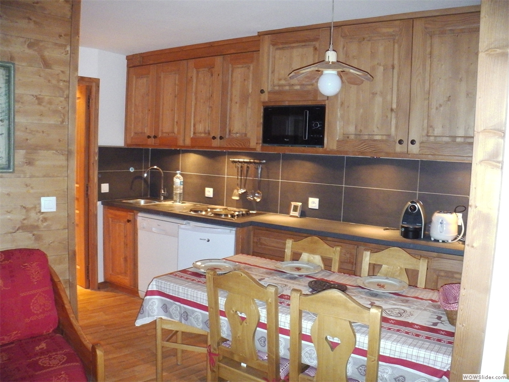 Vue de l'ensemble cuisine/salle à manger Vue de l'ensemble cuisine/salle à manger